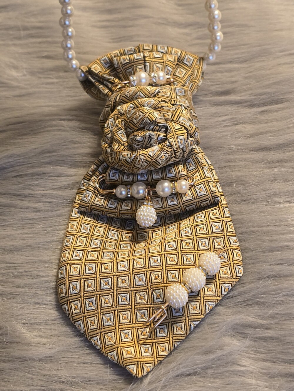 This beautiful customized Necktie Necklace can add an extra flare to any outfit.